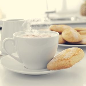 cappuccino and biscuits on the kitchen table