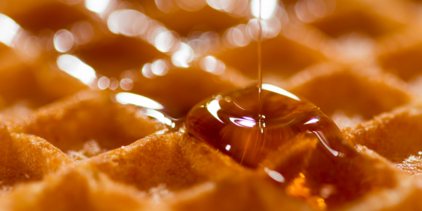 closeup of waffle with syrup
