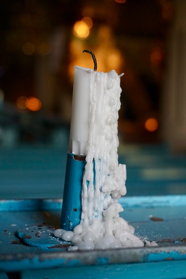 Wax spill down a candle stick