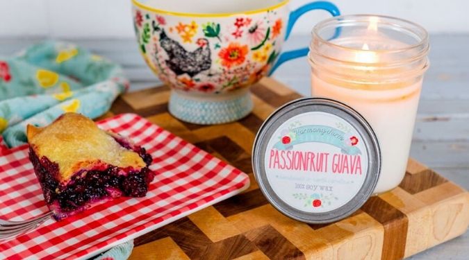 Harmony Farms Passion Guava candle blueberry pie tea served wooden tray