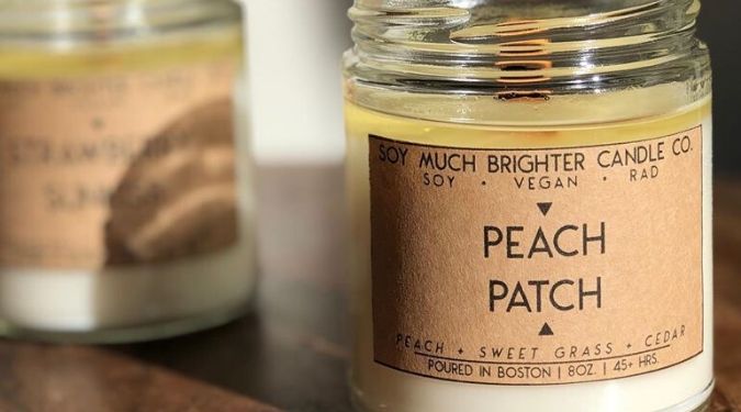 Soy Much Brighter peach patch soy candle burning