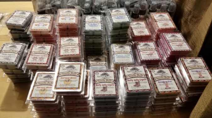 Strong Roots Soap Company clamshell wax melts stacked high