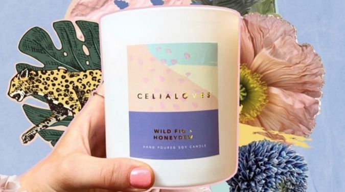 mae and june at celia loves candle white vessel colorful label with floral background
