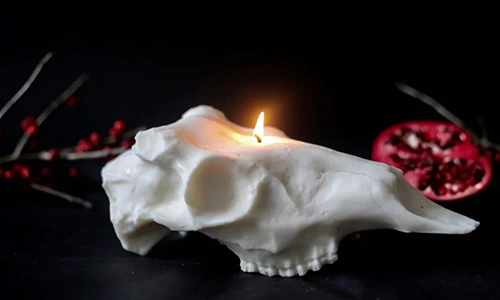 Evangeline Linens Skull Candle
