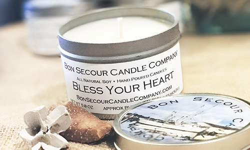 Bon Secour Candle Company soy candle displayed with coastal-inspired décor in Alabama