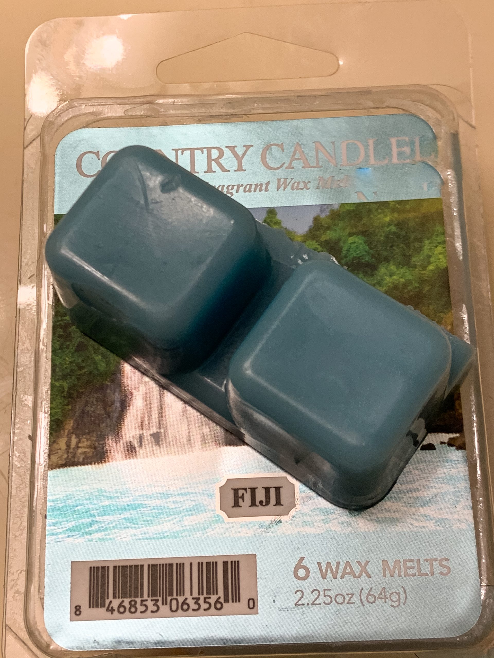 Blue Fiji wax melts from Country Candle displayed on the original wax melt package