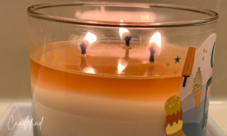 Bath & Body Works Ice Cream Bar candle burning with a full melt pool and three flames