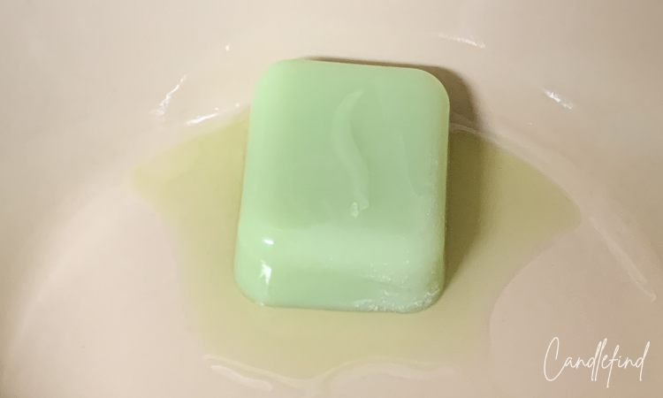 Single cube of Febreze Gain wax melt in a wax warmer